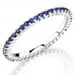 blue sapphire prong set eternity ring